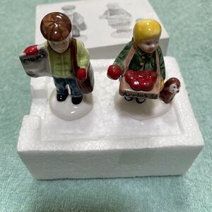 Department 56 Snow Village Girl Selling Apples and News Boy 5129-2 set of 2